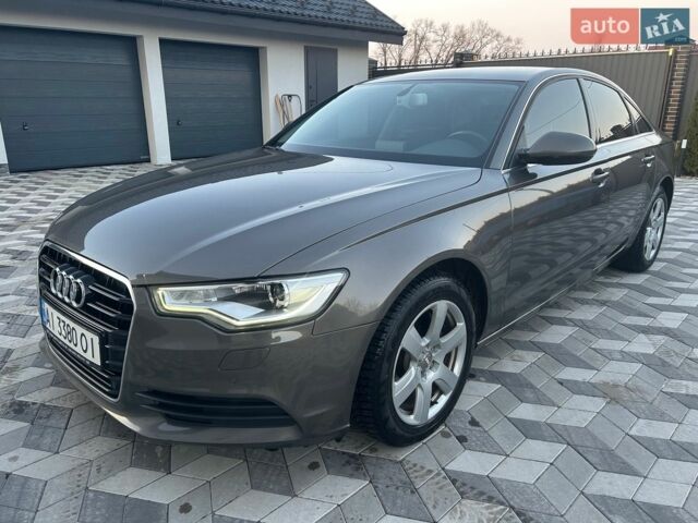 Сірий Ауді А6, об'ємом двигуна 2 л та пробігом 202 тис. км за 12900 $, фото 1 на Automoto.ua