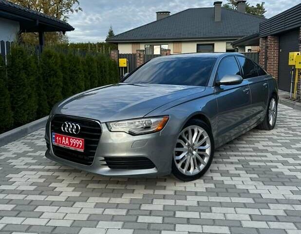 Сірий Ауді А6, об'ємом двигуна 2 л та пробігом 196 тис. км за 12150 $, фото 1 на Automoto.ua