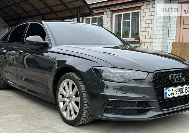 Сірий Ауді А6, об'ємом двигуна 3 л та пробігом 214 тис. км за 17600 $, фото 1 на Automoto.ua