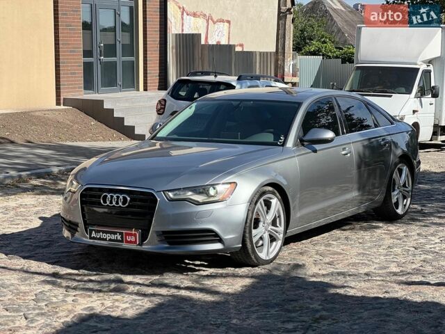Сірий Ауді А6, об'ємом двигуна 2 л та пробігом 228 тис. км за 13990 $, фото 1 на Automoto.ua