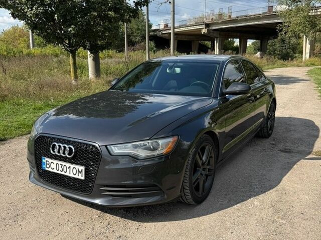 Сірий Ауді А6, об'ємом двигуна 2 л та пробігом 209 тис. км за 15000 $, фото 1 на Automoto.ua