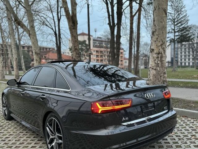 Серый Ауди А6, объемом двигателя 2 л и пробегом 200 тыс. км за 17193 $, фото 1 на Automoto.ua