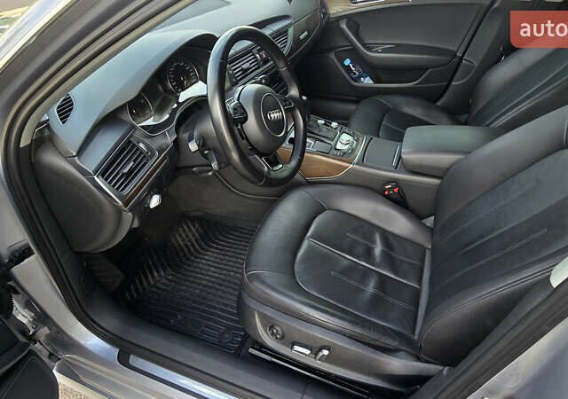 Серый Ауди А6, объемом двигателя 2 л и пробегом 195 тыс. км за 25000 $, фото 1 на Automoto.ua