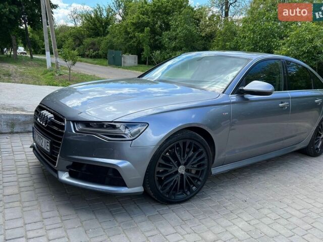 Серый Ауди А6, объемом двигателя 2 л и пробегом 190 тыс. км за 16800 $, фото 1 на Automoto.ua