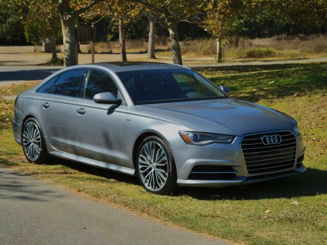 Серый Ауди А6, объемом двигателя 2 л и пробегом 83 тыс. км за 14100 $, фото 1 на Automoto.ua