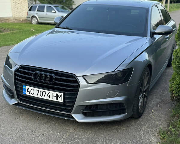 Сірий Ауді А6, об'ємом двигуна 2 л та пробігом 230 тис. км за 15000 $, фото 1 на Automoto.ua