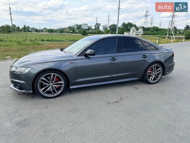 Серый Ауди А6, объемом двигателя 3 л и пробегом 133 тыс. км за 23000 $, фото 1 на Automoto.ua