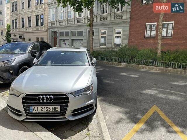 Сірий Ауді А6, об'ємом двигуна 1.97 л та пробігом 49 тис. км за 26400 $, фото 1 на Automoto.ua