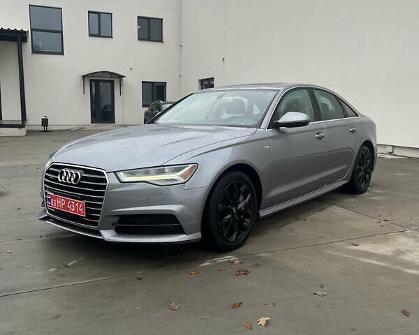 Сірий Ауді А6, об'ємом двигуна 1.98 л та пробігом 209 тис. км за 17999 $, фото 1 на Automoto.ua