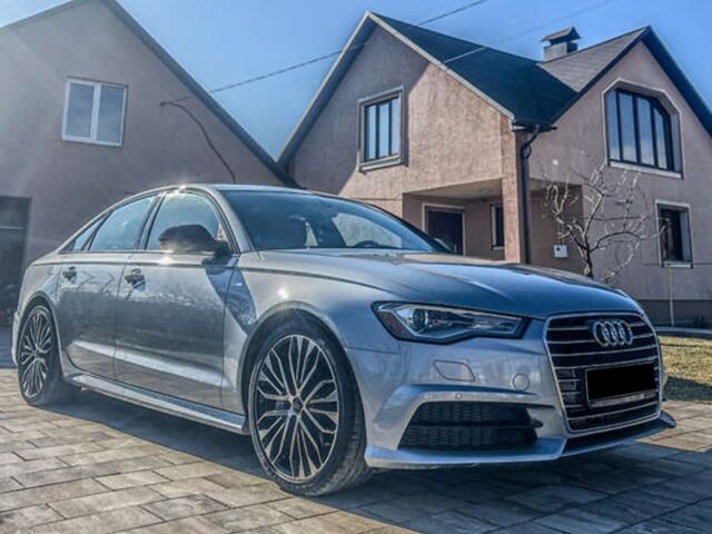 Сірий Ауді А6, об'ємом двигуна 1.98 л та пробігом 59 тис. км за 15400 $, фото 1 на Automoto.ua