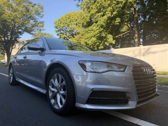 Серый Ауди А6, объемом двигателя 2 л и пробегом 52 тыс. км за 6815 $, фото 1 на Automoto.ua