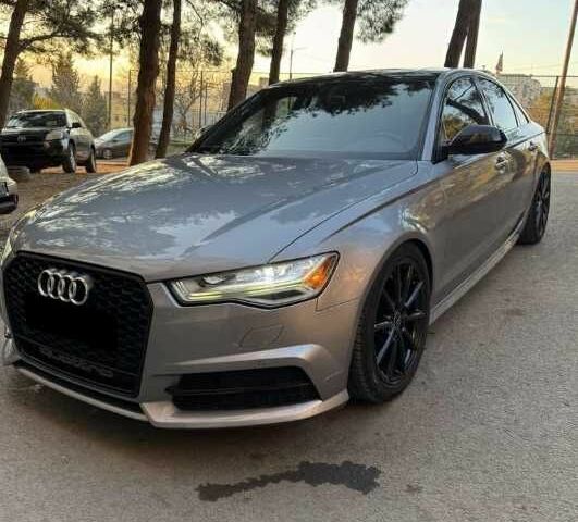 Сірий Ауді А6, об'ємом двигуна 2 л та пробігом 89 тис. км за 14200 $, фото 1 на Automoto.ua