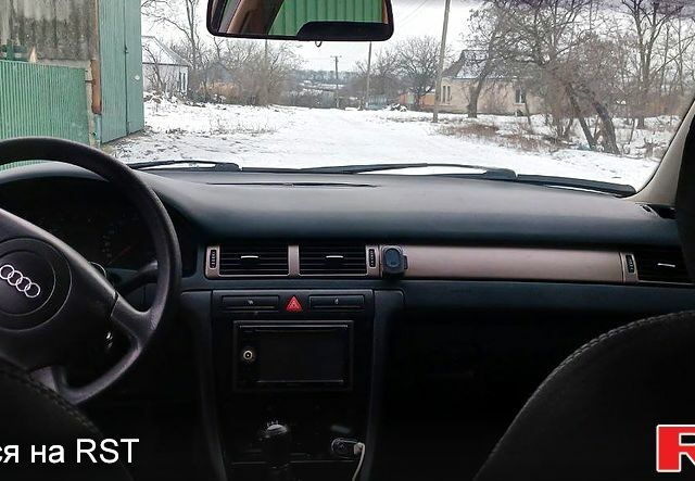 Серый Ауди А6, объемом двигателя 1.8 л и пробегом 216 тыс. км за 3950 $, фото 1 на Automoto.ua