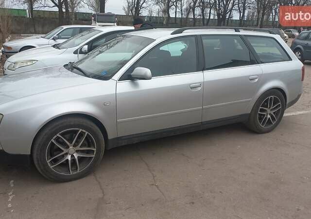 Серый Ауди А6, объемом двигателя 2.5 л и пробегом 275 тыс. км за 4000 $, фото 1 на Automoto.ua