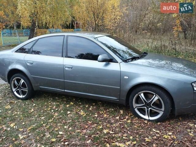 Серый Ауди А6, объемом двигателя 2.4 л и пробегом 350 тыс. км за 6200 $, фото 1 на Automoto.ua