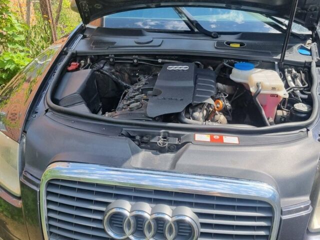 Серый Ауди А6, объемом двигателя 2 л и пробегом 312 тыс. км за 7800 $, фото 1 на Automoto.ua