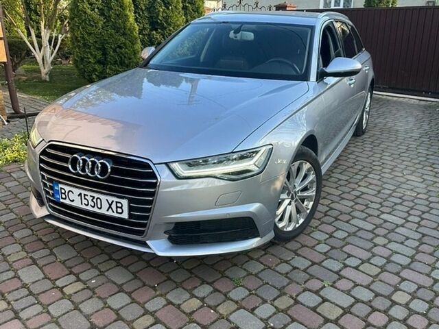 Сірий Ауді А6, об'ємом двигуна 1.97 л та пробігом 242 тис. км за 18999 $, фото 1 на Automoto.ua