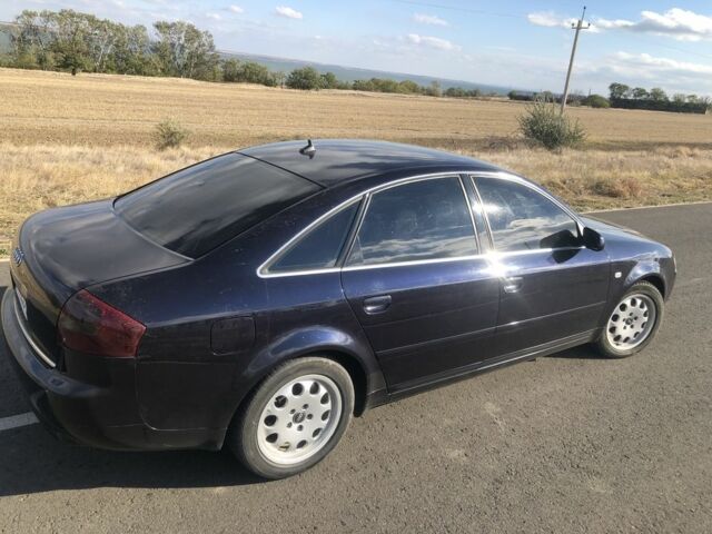 Синий Ауди А6, объемом двигателя 2.4 л и пробегом 570 тыс. км за 5000 $, фото 1 на Automoto.ua