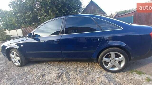 Синій Ауді А6, об'ємом двигуна 2.5 л та пробігом 390 тис. км за 4699 $, фото 1 на Automoto.ua