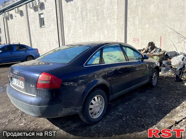 Синий Ауди А6, объемом двигателя 2.4 л и пробегом 256 тыс. км за 2600 $, фото 1 на Automoto.ua