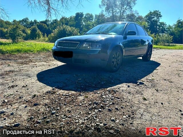 Синий Ауди А6, объемом двигателя 1.8 л и пробегом 400 тыс. км за 3700 $, фото 1 на Automoto.ua