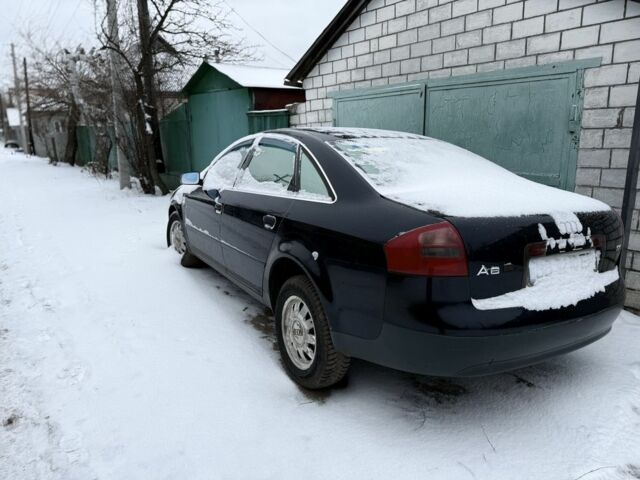 Синий Ауди А6, объемом двигателя 2.4 л и пробегом 300 тыс. км за 2200 $, фото 1 на Automoto.ua