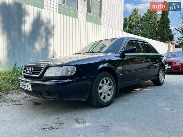 Синий Ауди А6, объемом двигателя 2.6 л и пробегом 400 тыс. км за 2800 $, фото 1 на Automoto.ua