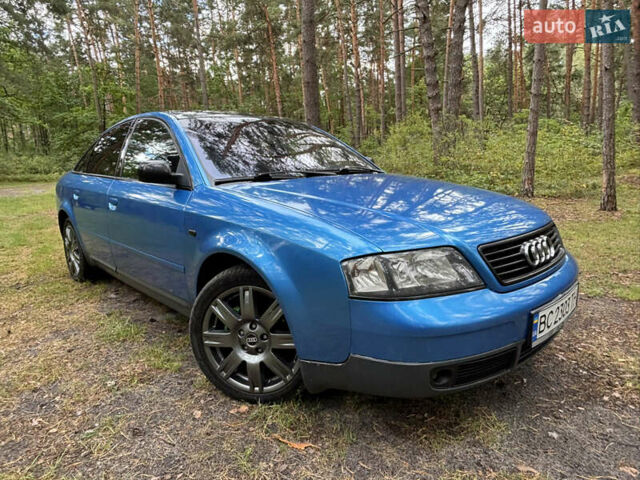 Синий Ауди А6, объемом двигателя 2.39 л и пробегом 289 тыс. км за 4100 $, фото 1 на Automoto.ua