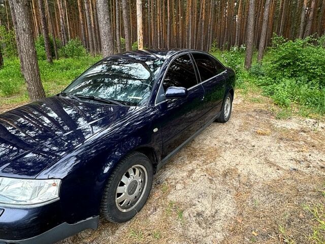 Синий Ауди А6, объемом двигателя 1.8 л и пробегом 346 тыс. км за 4700 $, фото 1 на Automoto.ua