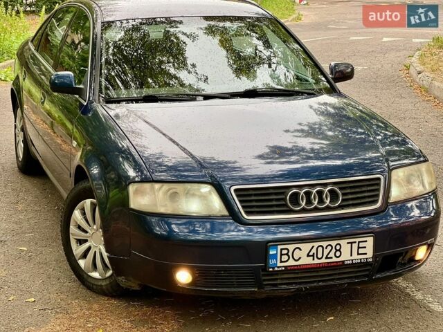 Синий Ауди А6, объемом двигателя 1.8 л и пробегом 320 тыс. км за 2499 $, фото 1 на Automoto.ua