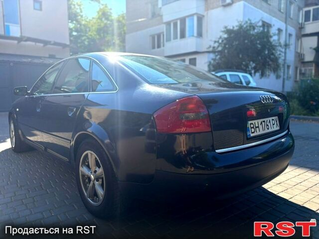 Синій Ауді А6, об'ємом двигуна 1.8 л та пробігом 330 тис. км за 4500 $, фото 1 на Automoto.ua