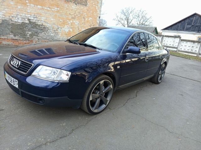 Синий Ауди А6, объемом двигателя 1.8 л и пробегом 265 тыс. км за 4400 $, фото 1 на Automoto.ua