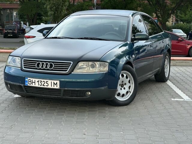 Синий Ауди А6, объемом двигателя 2.5 л и пробегом 300 тыс. км за 2900 $, фото 1 на Automoto.ua