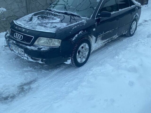 Синий Ауди А6, объемом двигателя 2.5 л и пробегом 300 тыс. км за 4000 $, фото 1 на Automoto.ua