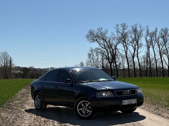 Синий Ауди А6, объемом двигателя 2.4 л и пробегом 550 тыс. км за 2700 $, фото 1 на Automoto.ua