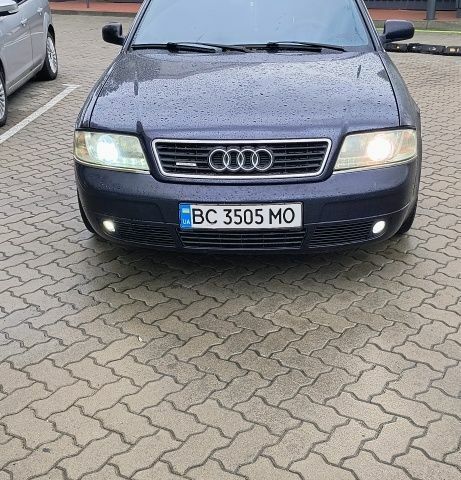 Синий Ауди А6, объемом двигателя 1.8 л и пробегом 300 тыс. км за 3500 $, фото 1 на Automoto.ua