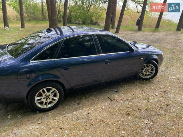 Синий Ауди А6, объемом двигателя 1.8 л и пробегом 325 тыс. км за 4700 $, фото 1 на Automoto.ua