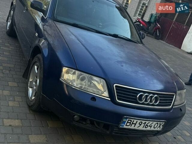 Синий Ауди А6, объемом двигателя 2.5 л и пробегом 262 тыс. км за 3700 $, фото 1 на Automoto.ua