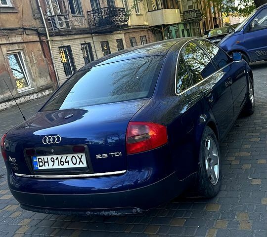 Синий Ауди А6, объемом двигателя 2.5 л и пробегом 262 тыс. км за 3700 $, фото 1 на Automoto.ua
