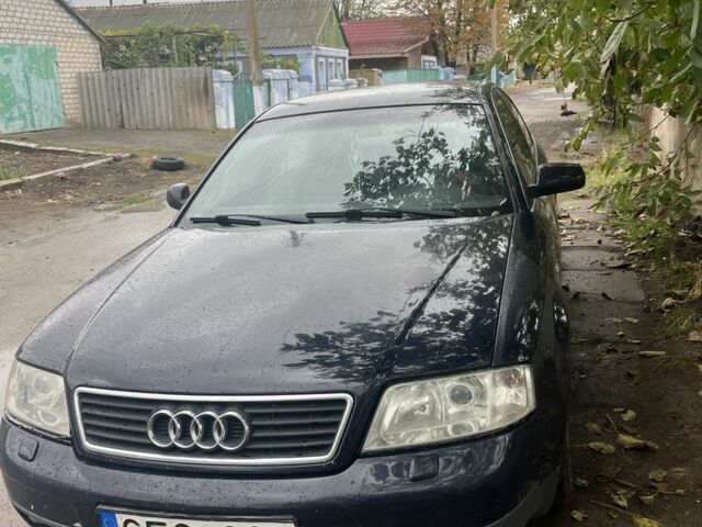 Синій Ауді А6, об'ємом двигуна 1.8 л та пробігом 300 тис. км за 1350 $, фото 1 на Automoto.ua