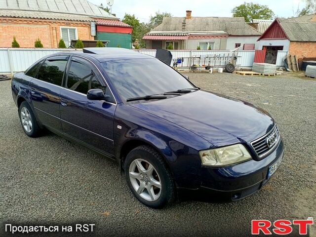 Синий Ауди А6, объемом двигателя 1.8 л и пробегом 200 тыс. км за 3850 $, фото 1 на Automoto.ua