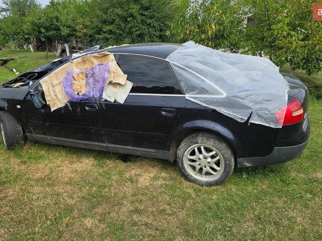 Синий Ауди А6, объемом двигателя 2.39 л и пробегом 400 тыс. км за 1000 $, фото 1 на Automoto.ua