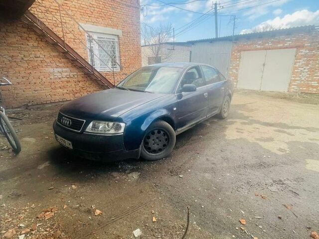Синий Ауди А6, объемом двигателя 2.5 л и пробегом 200 тыс. км за 5500 $, фото 1 на Automoto.ua