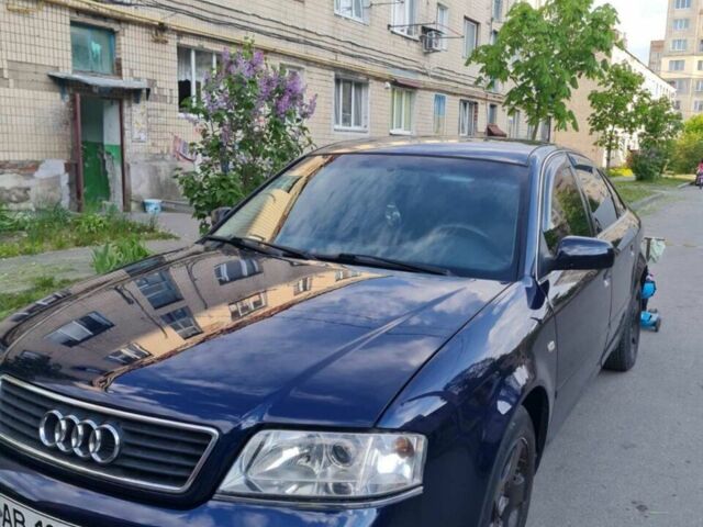 Синий Ауди А6, объемом двигателя 1.8 л и пробегом 322 тыс. км за 4500 $, фото 1 на Automoto.ua