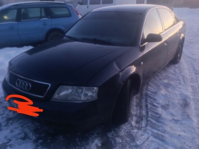 Синий Ауди А6, объемом двигателя 1.9 л и пробегом 324 тыс. км за 600 $, фото 1 на Automoto.ua