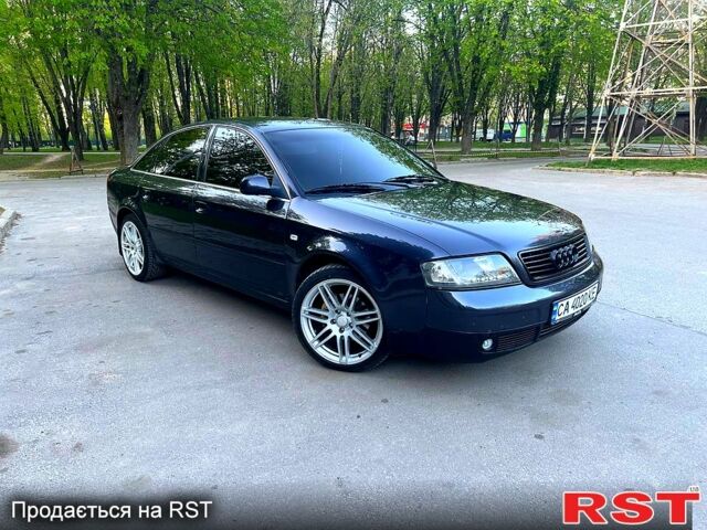 Синий Ауди А6, объемом двигателя 2.5 л и пробегом 320 тыс. км за 4500 $, фото 1 на Automoto.ua