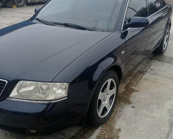 Синий Ауди А6, объемом двигателя 2.5 л и пробегом 290 тыс. км за 5000 $, фото 1 на Automoto.ua