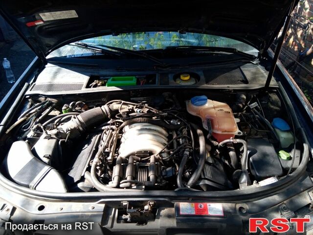 Синий Ауди А6, объемом двигателя 2.4 л и пробегом 300 тыс. км за 2600 $, фото 1 на Automoto.ua