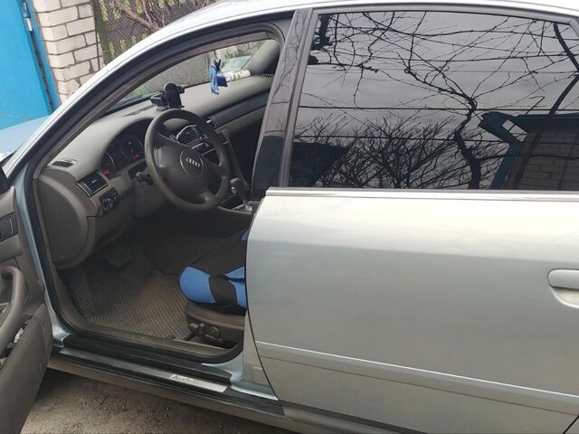 Синий Ауди А6, объемом двигателя 2.5 л и пробегом 370 тыс. км за 4000 $, фото 1 на Automoto.ua