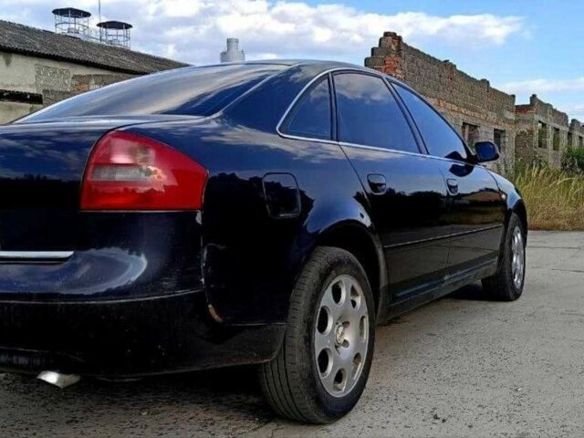 Синий Ауди А6, объемом двигателя 2.4 л и пробегом 317 тыс. км за 4500 $, фото 1 на Automoto.ua